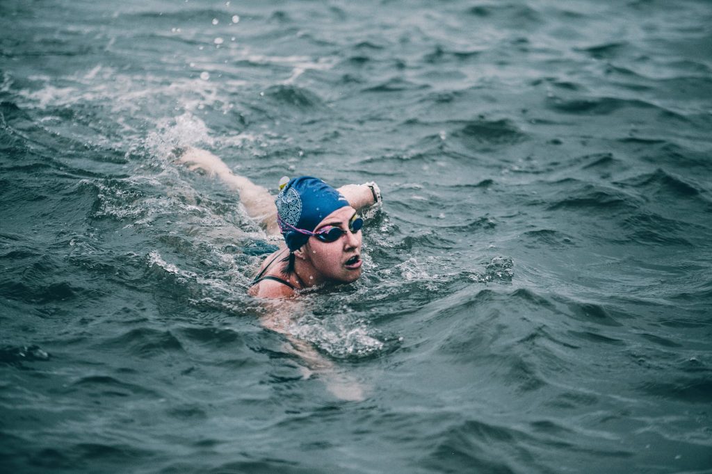 woman swimming in triathalon